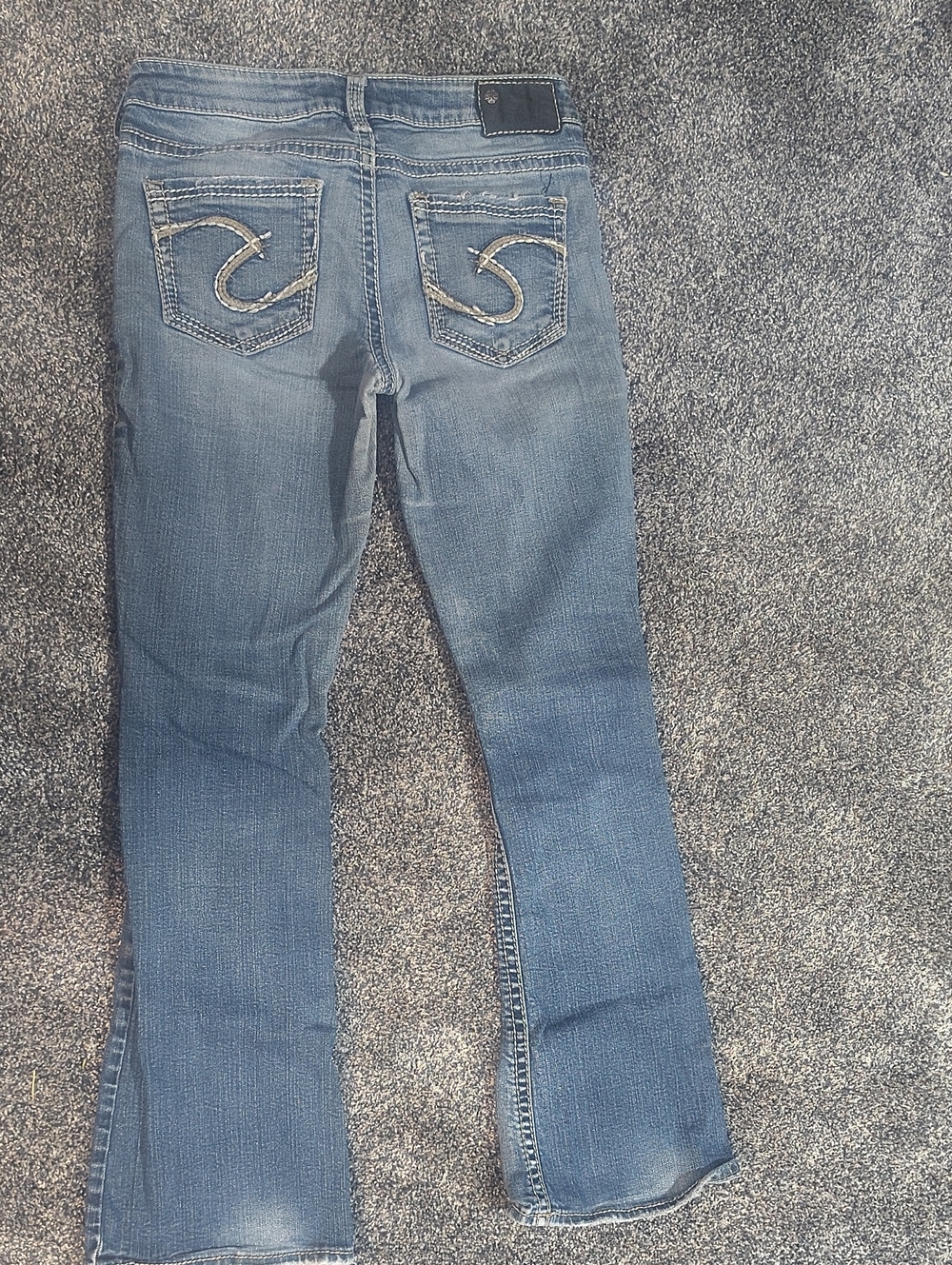 Silver Jeans Medium Blue Flare Jeans with Embroidered Back Pockets